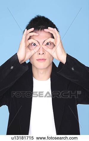 Stock Photography - Young man making a face. Fotosearch