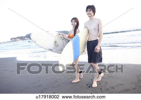 Young surfers at Enoshima beach View Large Photo Image Stock Image - Young surfers at Enoshima beach. Fotosearch
