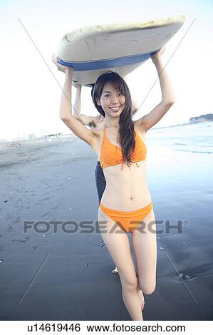 Young surfers at Enoshima beach View Large Photo Image Stock Photograph - Young surfers at Enoshima beach. Fotosearch