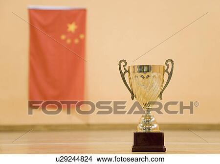 Close-up of a golden trophy cup View Large Photo Image Picture - Close-up of a golden trophy cup. Fotosearch