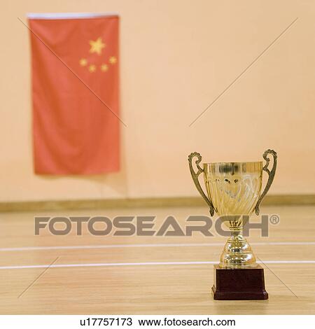 Close-up of a golden trophy cup View Large Photo Image Stock Image - Close-up of a golden trophy cup. Fotosearch