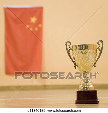Close-up of a golden trophy cup View Large Photo Image Stock Photo - Close-up of a golden trophy cup. Fotosearch