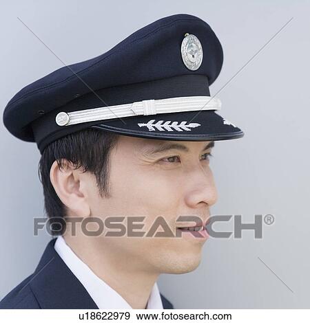 Stock Photo - Close-up of a pilot smiling. Fotosearch