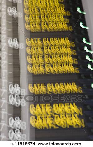 Picture - Close-up of an arrival departure board at an airport. Fotosearch