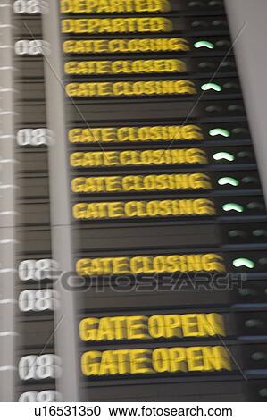Close-up of an arrival departure board at an airport View Large Photo Image Stock Image - Close-up of an arrival departure board at an airport. Fotosearch