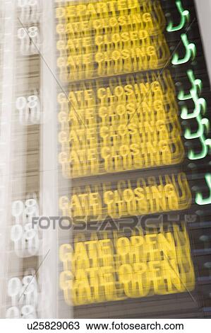 Close-up of an arrival departure board at an airport View Large Photo Image Stock Image - Close-up of an arrival departure board at an airport. Fotosearch