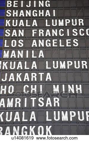 Close-up of an arrival departure board at an airport View Large Photo Image Stock Photo - Close-up of an arrival departure board at an airport. Fotosearch