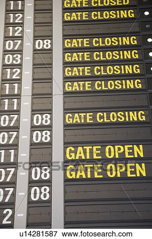 Close-up of an arrival departure board at an airport View Large Photo Image Stock Photo - Close-up of an arrival departure board at an airport. Fotosearch