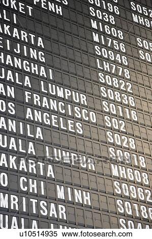 Close-up of an arrival departure board at an airport View Large Photo Image Stock Photography - Close-up of an arrival departure board at an airport. Fotosearch