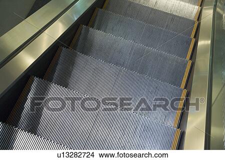 Picture - Close-up of an escalator. Fotosearch