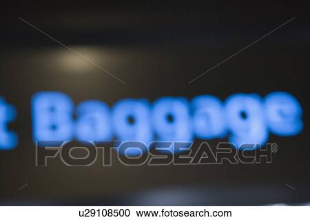 Stock Image - Close-up of an information sign at an airport. Fotosearch