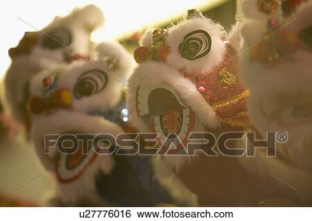 Stock Photograph - Close-up of Chinese lion puppets. Fotosearch