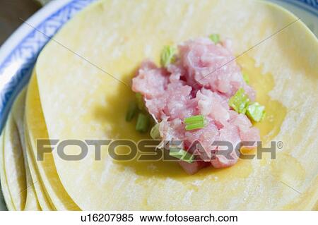 Close-up of stuffing on Chinese dumplings View Large Photo Image Stock Photography - Close-up of stuffing on Chinese dumplings. Fotosearch