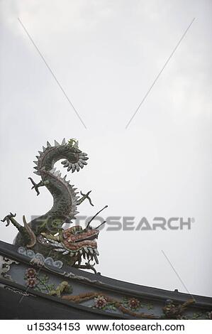 Low angle view of a dragon sculpture in a temple View Large Photo Image Stock Image - Low angle view of a dragon sculpture in a temple. Fotosearch
