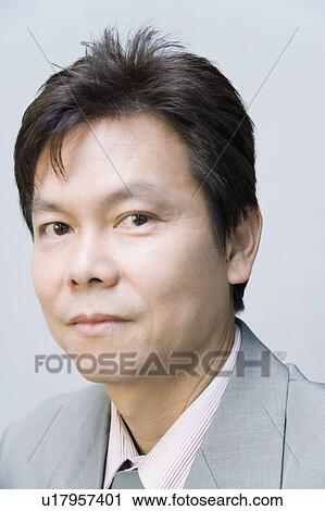 Portrait of a businessman View Large Photo Image Stock Image - Portrait of a businessman. Fotosearch