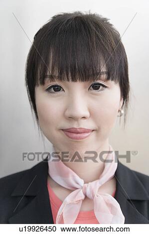 Portrait of a cabin crew smiling View Large Photo Image Stock Image - Portrait of a cabin crew smiling. Fotosearch