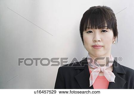 Portrait of a cabin crew wearing a neckerchief View Large Photo Image Stock Photo - Portrait of a cabin crew wearing a neckerchief. Fotosearch