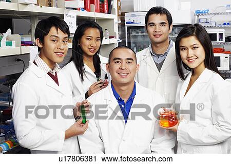 Portrait of a group of pharmacists in a laboratory View Large Photo Image Stock Image - Portrait of a group of pharmacists in a laboratory. Fotosearch