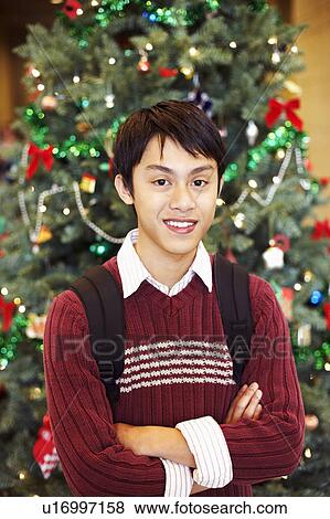 Stock Photo - Portrait of a young man smiling. Fotosearch