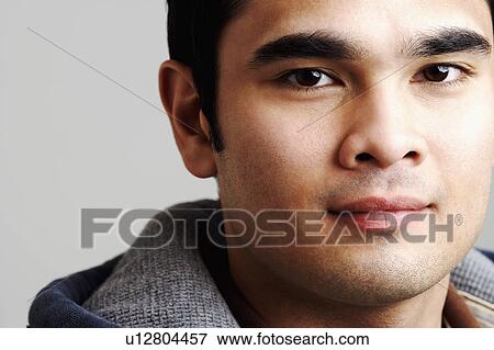 Portrait of a young man View Large Photo Image Stock Photo - Portrait of a young man. Fotosearch