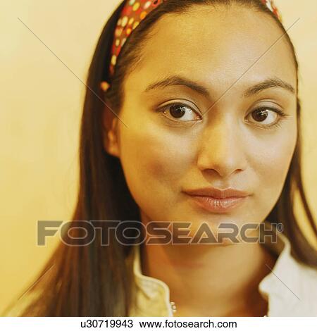 Stock Image - Portrait of a young woman. Fotosearch