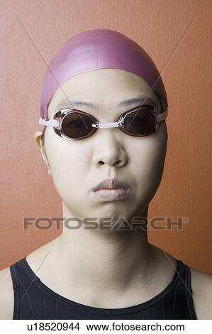 Picture - Portrait of a young woman wearing swimwear. Fotosearch