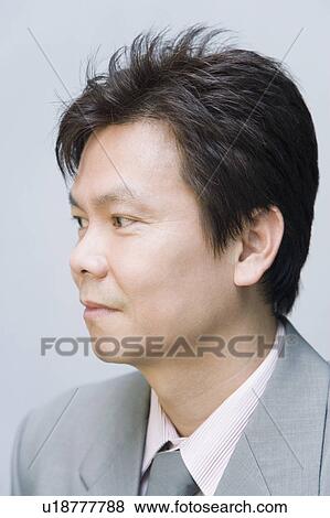 Stock Photo - Side profile of a businessman. Fotosearch