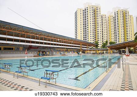Swimming pool in front of buildings, Clementi Swimming Complex, Clementi, Singapore View Large Photo Image Stock Image - Swimming pool in front of buildings, Clementi Swimming Complex, Clementi, Singapore. Fotosearch