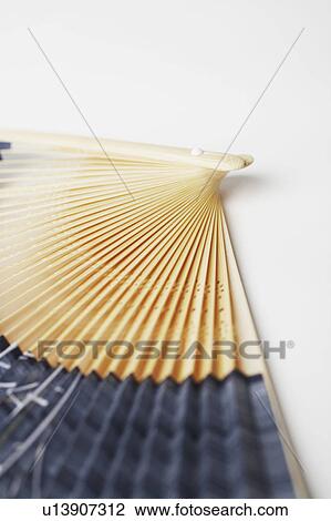 Close-up of a folding fan View Large Photo Image Stock Image - Close-up of a folding fan. Fotosearch
