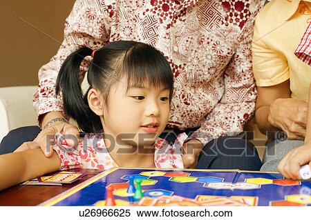 Close-up of a girl looking away View Large Photo Image Stock Photography - Close-up of a girl looking away. Fotosearch