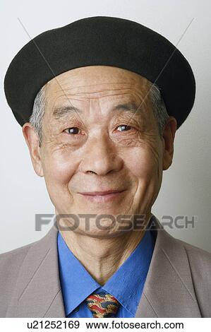 Close-up of a senior man smiling View Large Photo Image Stock Photo - Close-up of a senior man smiling. Fotosearch