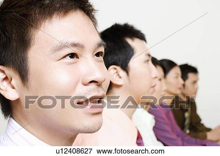 Stock Photo - Five business executives in a row. Fotosearch