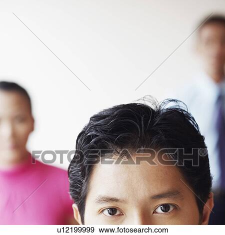 Stock Photo - Portrait of a businessman looking serious. Fotosearch