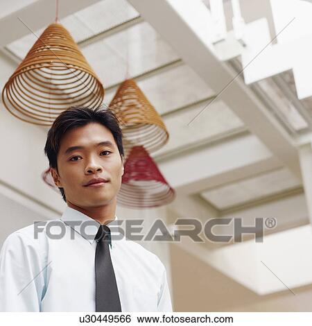 Portrait of a businessman View Large Photo Image Stock Photograph - Portrait of a businessman. Fotosearch
