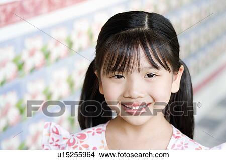 Picture - Portrait of a girl smiling. Fotosearch
