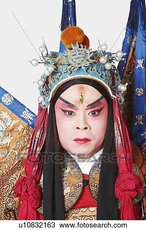Portrait of a male Chinese opera performer looking serious View Large Photo Image Stock Image - Portrait of a male Chinese opera performer looking serious. Fotosearch