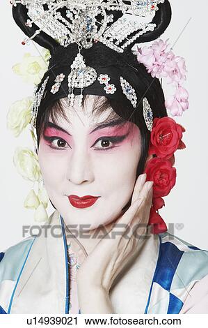Portrait of a mature woman wearing traditional clothing View Large Photo Image Stock Image - Portrait of a mature woman wearing traditional clothing. Fotosearch