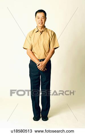 Portrait of a senior man standing View Large Photo Image Stock Image - Portrait of a senior man standing. Fotosearch