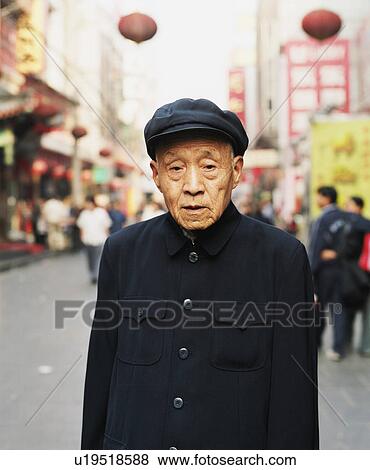 Stock Photo - Portrait of a senior man standing. Fotosearch