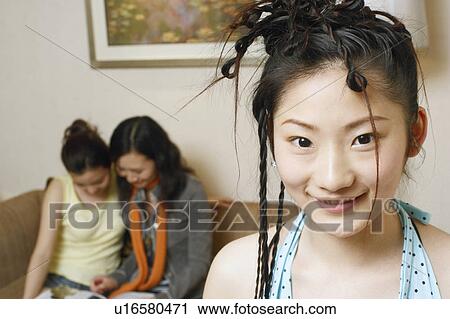 Portrait of a teenage girl smiling View Large Photo Image Stock Image - Portrait of a teenage girl smiling. Fotosearch