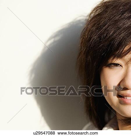 Stock Photo - Portrait of a teenager girl posing. Fotosearch