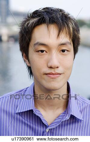 Stock Image - Portrait of a young man. Fotosearch