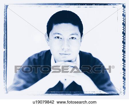 Portrait of a young man View Large Photo Image Stock Image - Portrait of a young man . Fotosearch