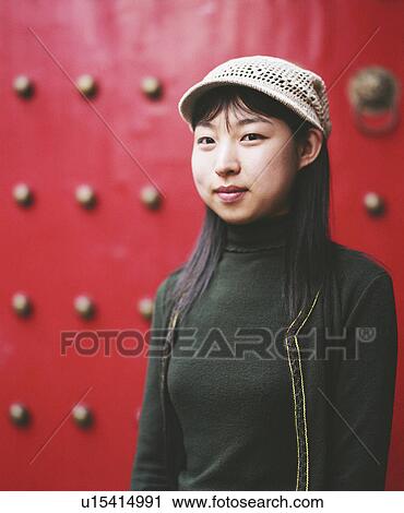 Portrait of a young woman smiling View Large Photo Image Stock Image - Portrait of a young woman smiling. Fotosearch