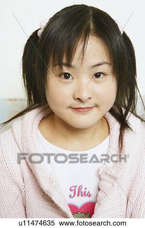 Stock Photography - Portrait of a young woman. Fotosearch
