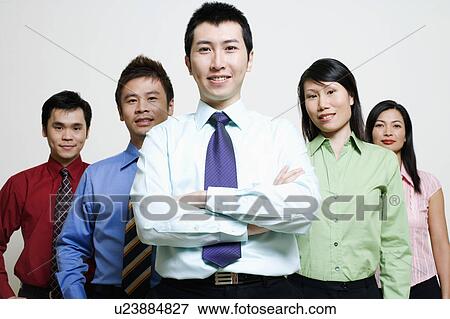 Portrait of five business executives standing together and smiling View Large Photo Image Stock Photo - Portrait of five business executives standing together and smiling. Fotosearch