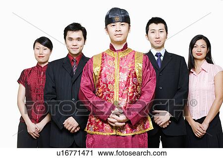 Portrait of four business executives and a young man standing together View Large Photo Image Stock Image - Portrait of four business executives and a young man standing together. Fotosearch