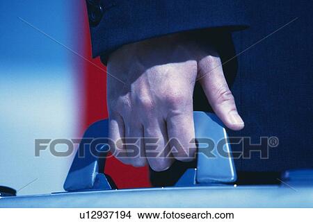 Hand holding business case, Close Up View Large Photo Image Picture - Hand holding business case, Close Up. Fotosearch