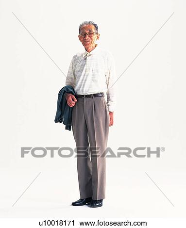 Stock Image - Senior adult man standing, Front View. Fotosearch