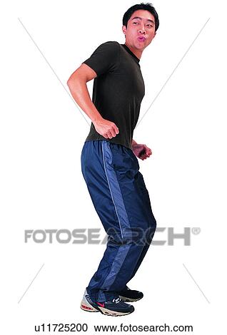 Asian, Dancing, One Person, Posing, Looking Sideways, Asian Expression View Large Photo Image Stock Image - Asian, Dancing, One Person, Posing, Looking Sideways, Asian Expression. Fotosearch